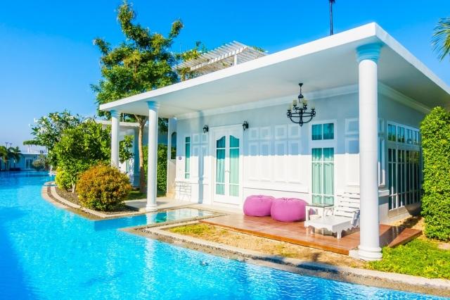 How a Stunning Pool Deck and Driveway Can Elevate Your Home's Curb Appeal
